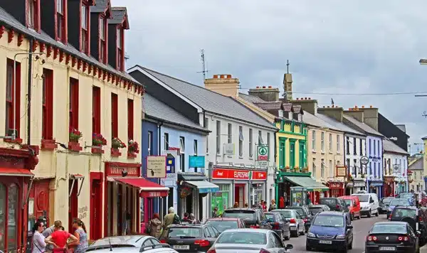Colourful street of shops in Schull, West Cork, Ireland