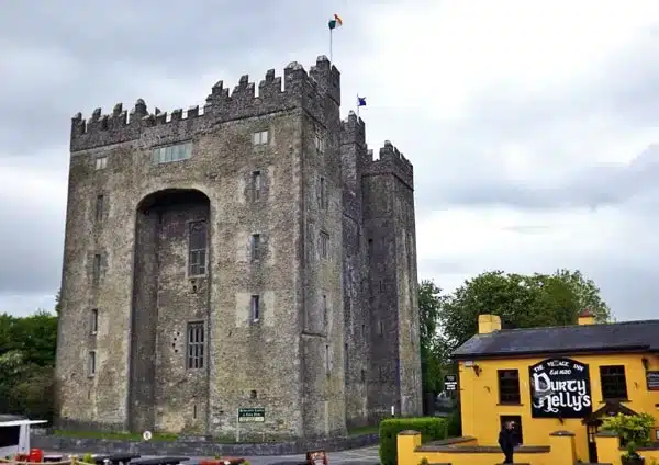 Bunratty Castle, County Clare, Ireland with Durty Nellys pub outside