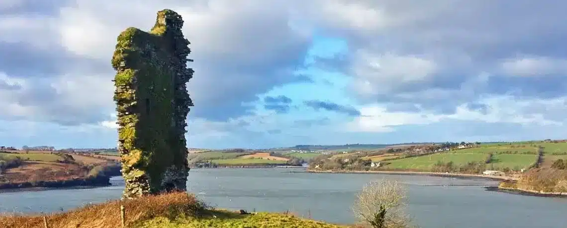 Irish ruin on hill looking out over the bay